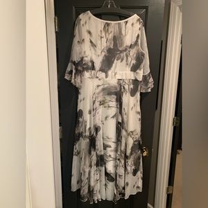 Lovely well made midi length dress. Never worn.